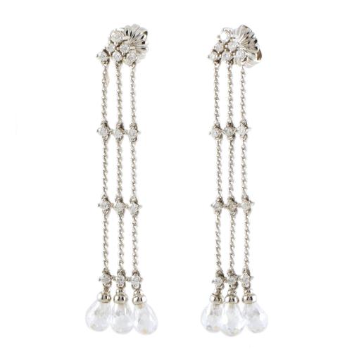 Pendientes largos semi articulados con diamantes.