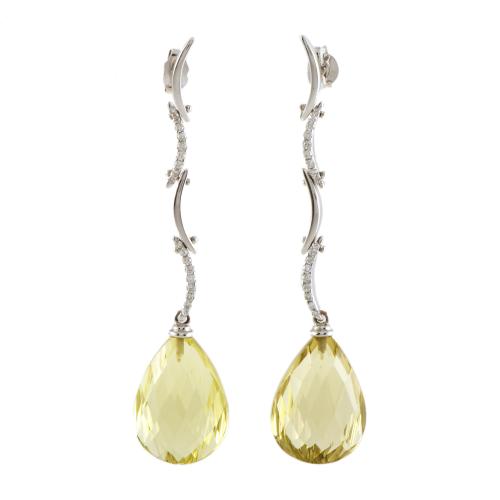 Pendientes largos con topacios verdes y diamantes.