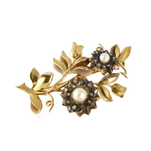 Broche años 50 estilo modernista, en forma floral con diamantes y perlas.