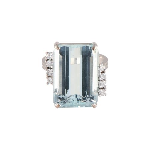 Ring with large aquamarine and diamonds.