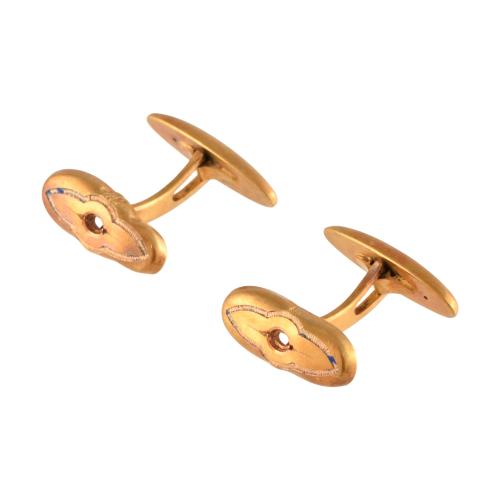 Set of four pairs of cufflinks.