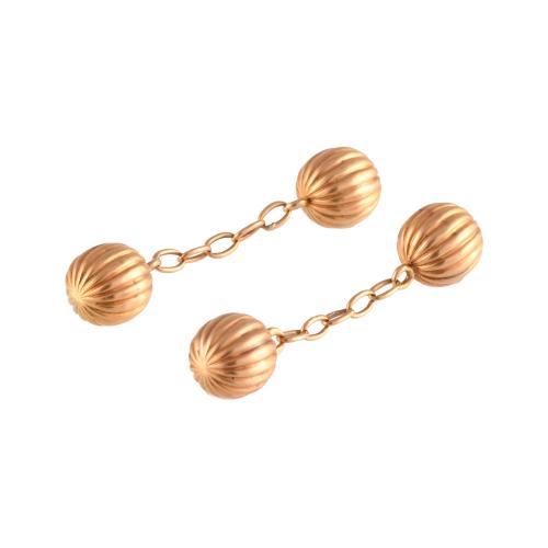 Set of four pairs of cufflinks.
