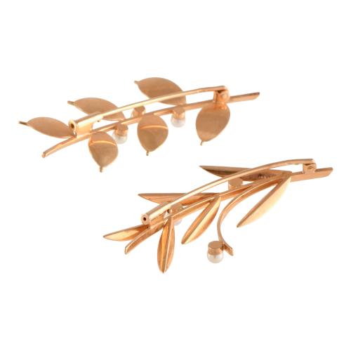 Pair of brooches with floral motifs and pearls.
