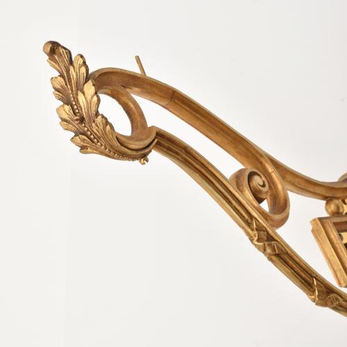 Pair of curtain rod brackets.