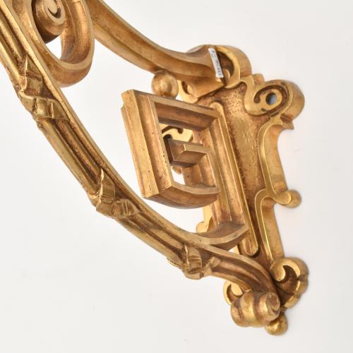 Pair of curtain rod brackets.