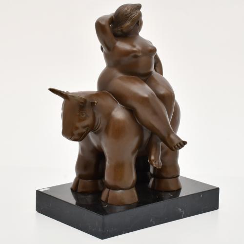 AFTER MODELS BY F. BOTERO, woman on a bull.