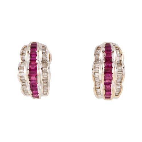 Earrings with three rows of rubies and diamonds.