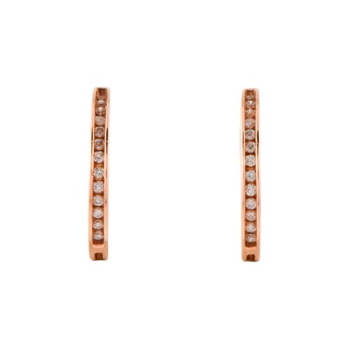 Pendientes aretes con diamantes.
