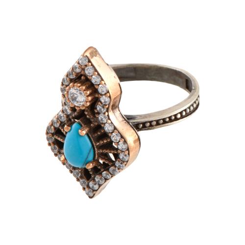 Ring with turqouise and zircons.