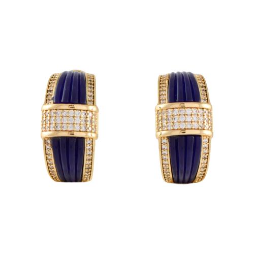 Wide hoop earrings with zircons.