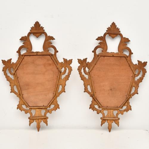 Pair of Spanish ornamental mirrors, mid 20th century.