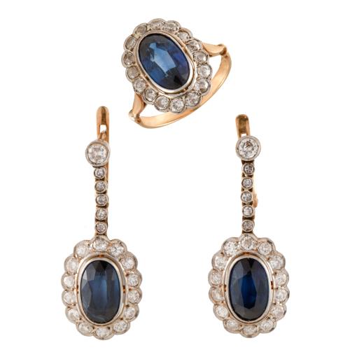 Conjunto de anillo y pendientes con zafiros  orlado rosetón