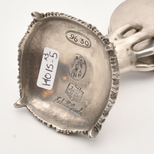Lote de tres porta-relojes, siglo XX.