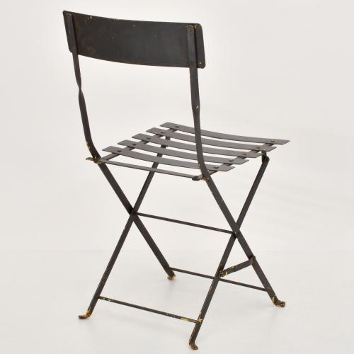 Conjunto de mesa y cuatro sillas de jardín, siglo XX.