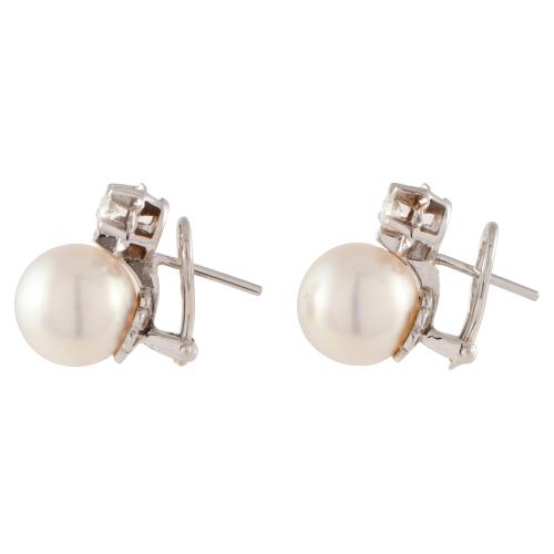 Pendientes tu y yo con perlas y diamantes. 