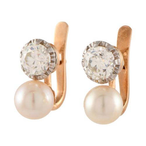 Pendientes tu y yo con diamante y perla.