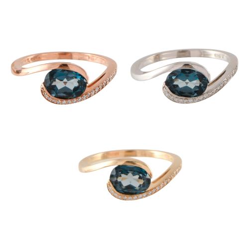 Lote de tres anillos con cuarzo azul y diamantes.