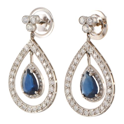 Teardrop-shaped pendant earrings with sapphire and diamonds.