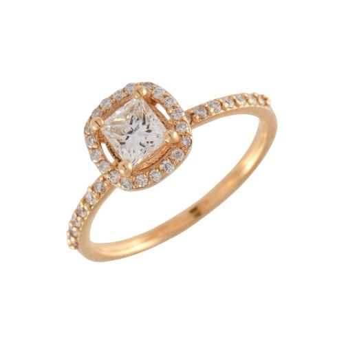 Anillo con diamante central y rosetón de diamantes.