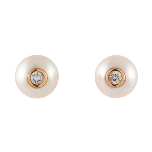Pendientes con perlas y diamantes.